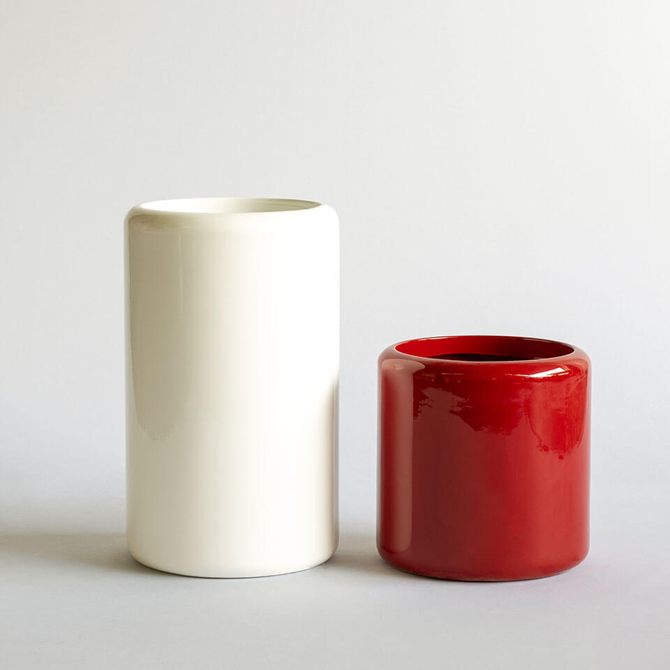 White & Red colored cyclindical designer planters in gloss finish